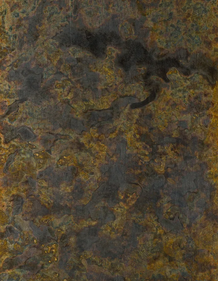 Handcrafted oxidised patina finish sample showing natural colour variation